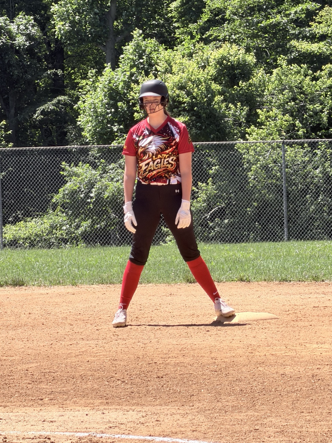 Lady Eagles runner standing ready on base